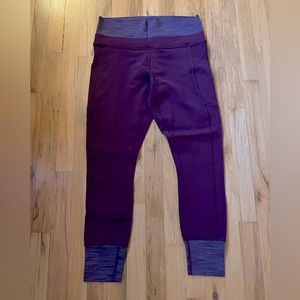 Burgundy Lululemon leggings with side pockets on both sides